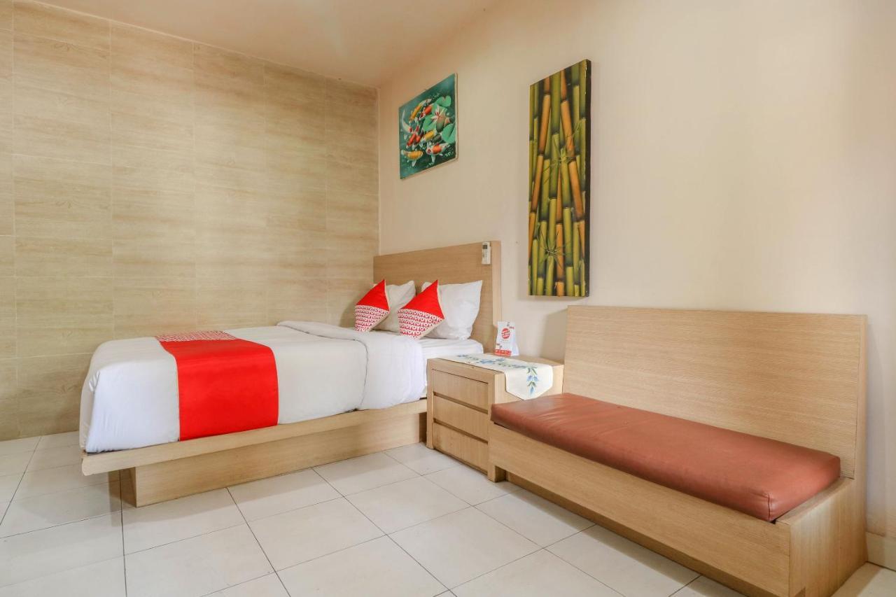 Oyo 2581 Ketut Smile Hotel Denpasa Buitenkant foto