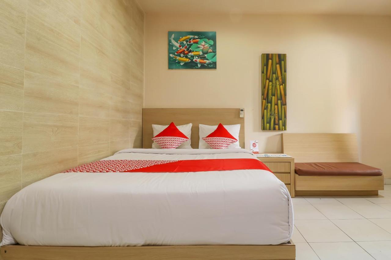 Oyo 2581 Ketut Smile Hotel Denpasa Buitenkant foto