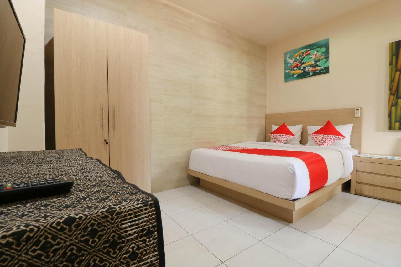 Oyo 2581 Ketut Smile Hotel Denpasa Buitenkant foto