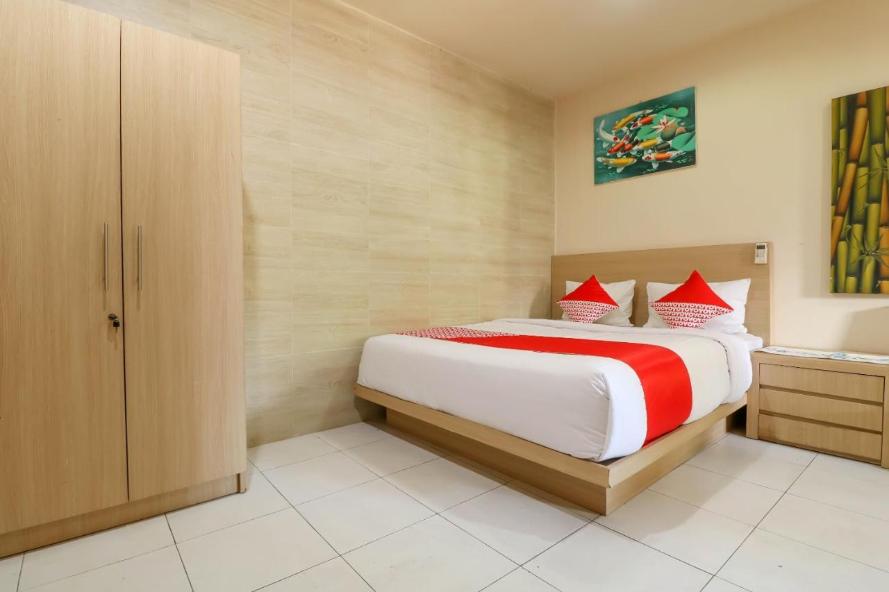 Oyo 2581 Ketut Smile Hotel Denpasa Buitenkant foto