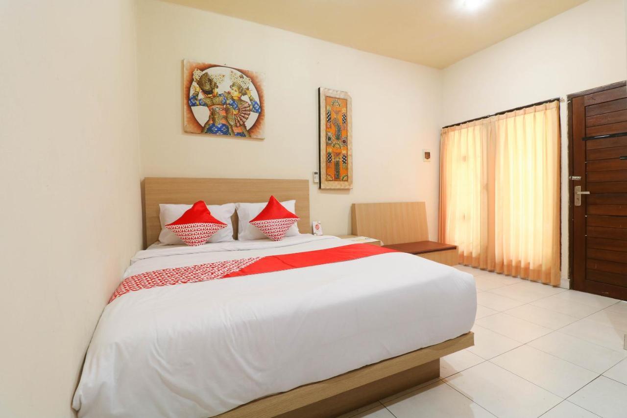 Oyo 2581 Ketut Smile Hotel Denpasa Buitenkant foto