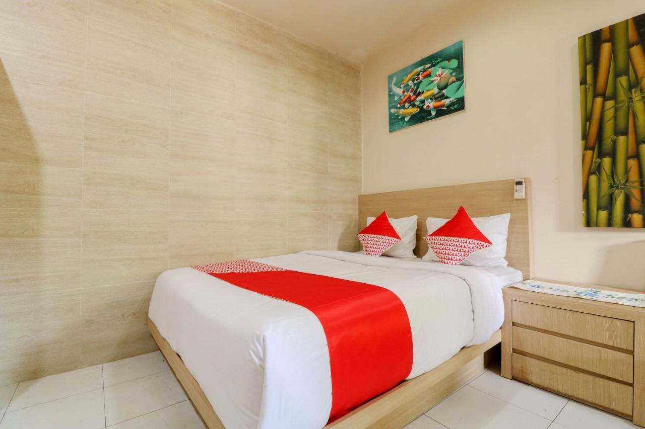 Oyo 2581 Ketut Smile Hotel Denpasa Buitenkant foto